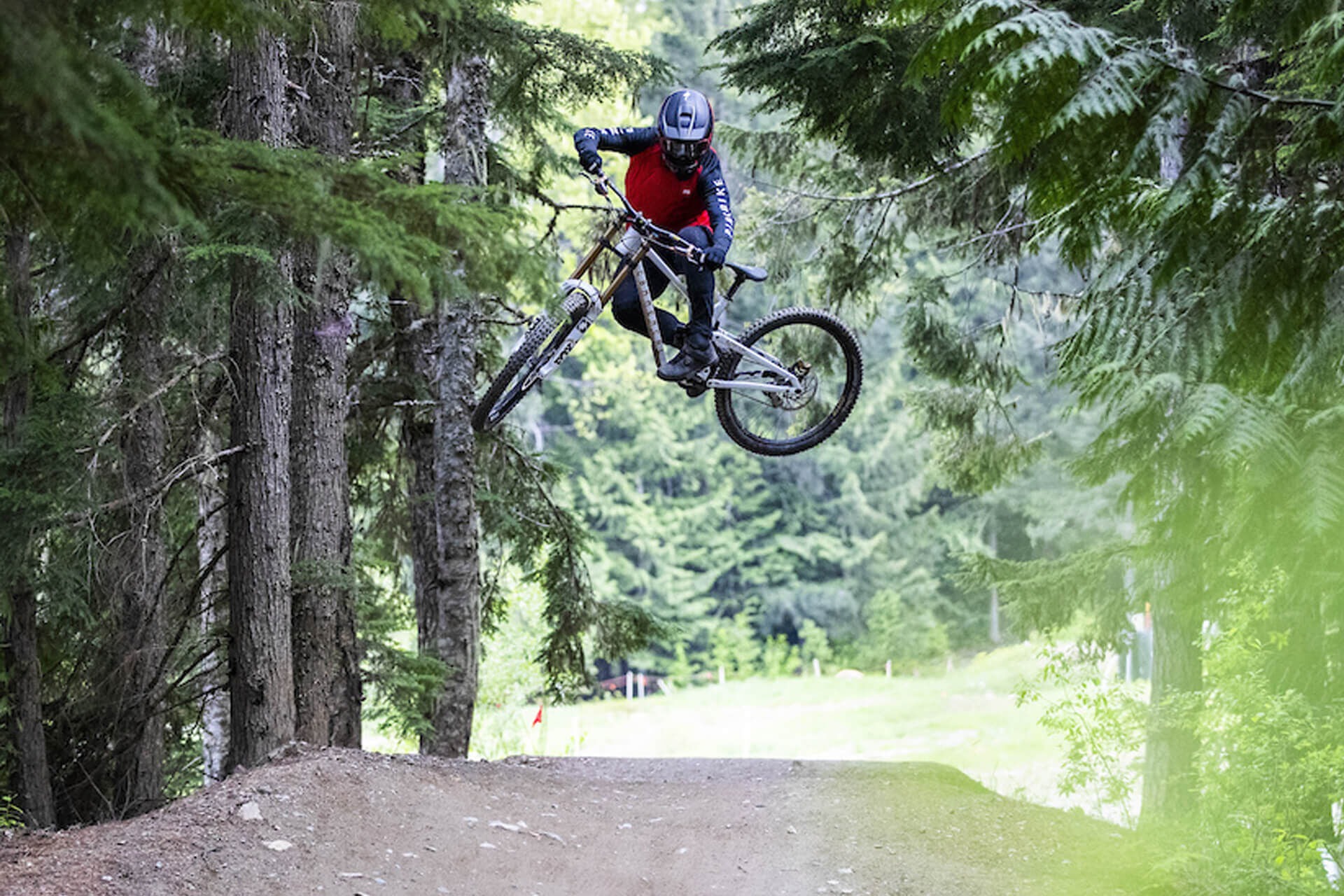 Mountain bike jump in the forest